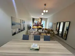 Furnished 2BR Apartment in Al Khan with Luxury Furniture, Free AC &amp; Parking – AED 75,000