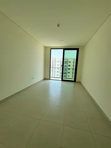 Luxury two-bedroom apartment with a living room, brand new, for annual rent in 12 installments – Al Zahia, Sharjah | Swimming pool – Free parking | Ne