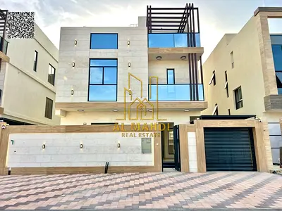Luxury villa for sale in Al Helio 2, Ajman including electricity, water, and central air conditioning