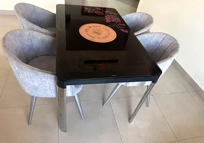 Dining table 299 , black glass top