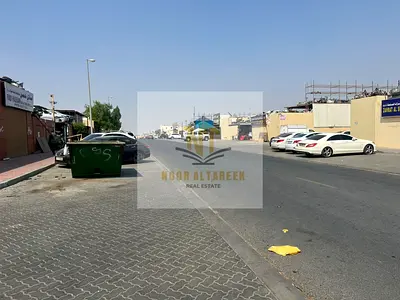 Freehold industrial land for sale in Al Sajaa area, walled, with all services, ready and currently leased. Various sizes available.