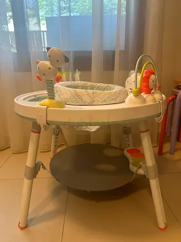 Baby jumper/exerciser with activity tray — good condition