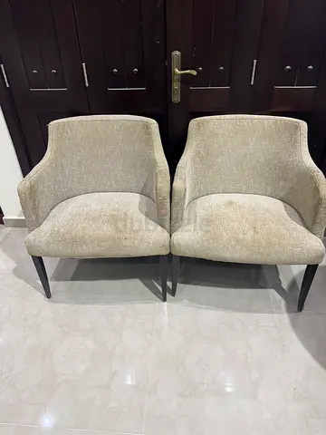 2 beige Arm chairs