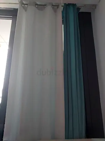 Layered fabric curtains with black, teal and white panels - ready to install