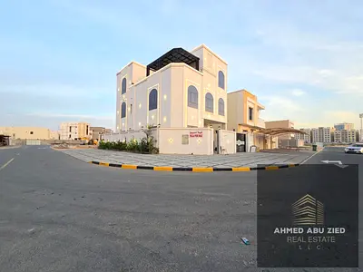 Luxury villa for sale in Al Amerah, Ajman, featuring an elegant design, high-end finishes, and a prime location that offers privacy and comfort.