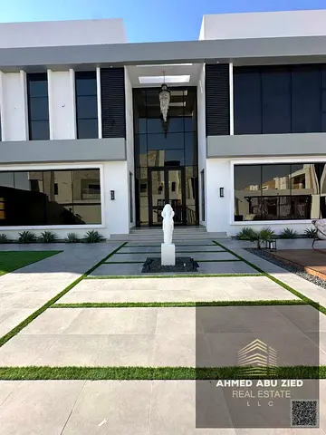 Super‑luxury villa with 4 master bedrooms, 2 halls, majlis, gym, pool, big garden, modern kitchen,