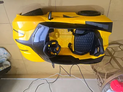 Yellow Electric Ride-On Toy Car for Kids — Single Seater, Remote/Manual Drive
