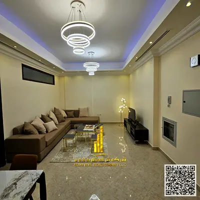 Luxury two-bedroom apartment with a living room and balcony offering an open view. Ajman, Al Rashidiya 3. Fully furnished.