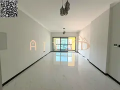 1BR apartment for annual rent in Al Mowaihat 3: free month, 2 balconies, central AC, 2 baths, wardro