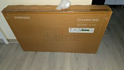 Samsung Crustal UHD DU7000 (stand not included) - excellent condition, screen wrap still on.