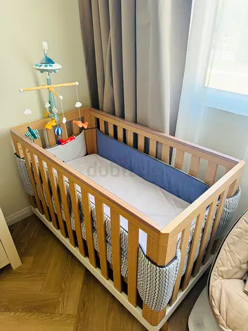 Natural solid wood baby crib