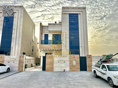 فيلا للبيع بتشطيبات شخصيه ومودرن مع تصميم مودرن وارتداد امام الفيلا في منطقة الحليو 2 بعجمان قريبه من الطرق الرئيسيه والسعر يشمل رسوم التسجل والتملك .
