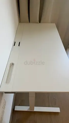 IKEA white adjustable standing desk - good condition. I bought this table on 1799. Very less used.