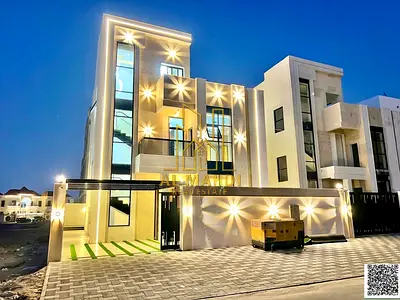 Direct from the owner, including all ownership fees: a villa in one of Ajman's most luxurious villas, built and finished to a super deluxe standard, w