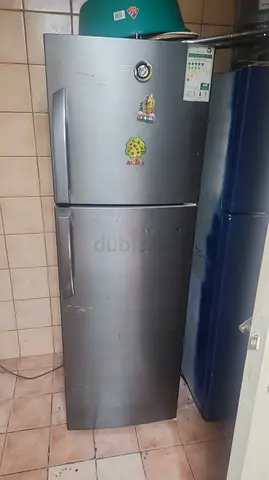 Used Silver Double-Door Refrigerator - Good Working Condition