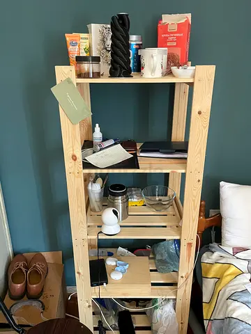 IKEA pine ladder-style shelving unit – natural wood, multi-shelf storage - last price 190 aed
