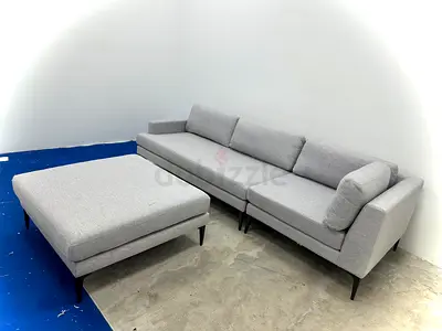 As perfect condition west elm sofa with footstool