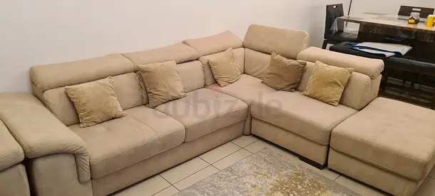 Beige L-shaped Fabric Corner Sofa with Ottoman - Good Condition
