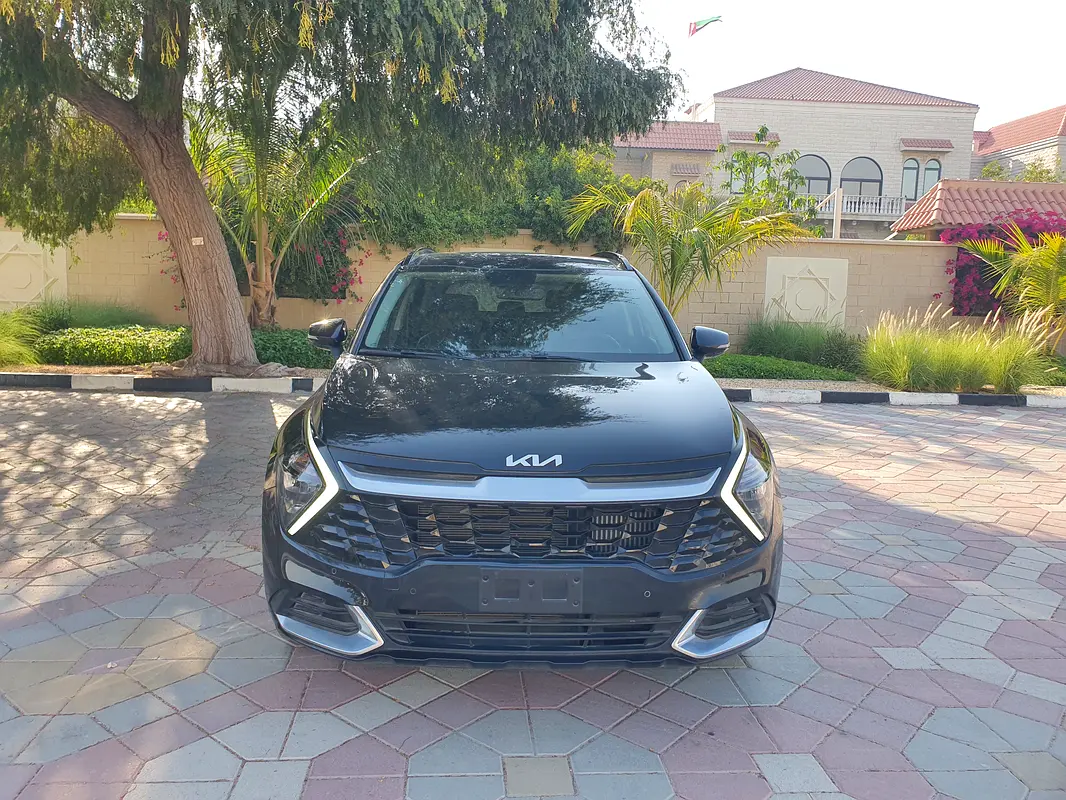 Kia Sportage 2024 — photo 1 of 17