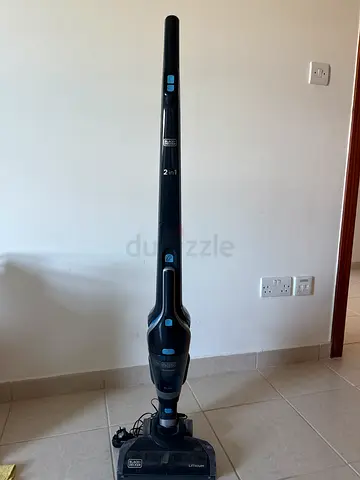 Used cordless stick vacuum cleaner (standalone unit) - good working condition. With charger, stand.