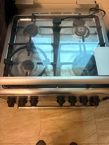 Stainless Steel 4-Burner Gas Stove with Oven Controls - Used
