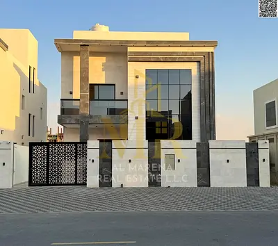 Luxury villa for sale in Al Amrah, Ajman | 5 master bedrooms + maid's room | Price: AED 1,800,000 (negotiable)