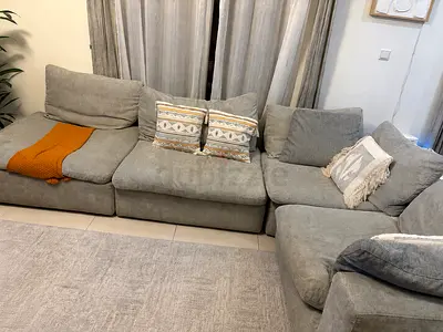 Comfortable L-shaped Grey Fabric Sofa - in very Good Condition for 1500 aed negotiable