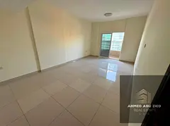 2BR + Hall in Al Nuaimiya 1 Ajman near Ghulfa Bridge, 3 baths, built-in wardrobes, laundry area