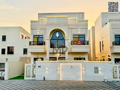 Villa for sale, including registration and ownership fees, near all services, close to Sheikh Mohammed Bin Zayed Road, on a main street, very prime lo