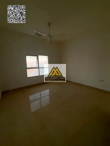 Studio for Annual Rent in Al Muwaihat 3 – Ajman | Semi-Closed Kitchen | Central AC | Prime Location