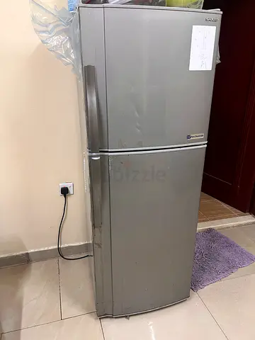 Silver double-door refrigerator - used, working condition