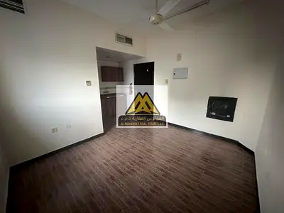 Studio in Al Rashidiya 1, Ajman. Central AC, excellent space, family building. AED 18,000 in 6 installments. Quiet living, close to services, prime lo