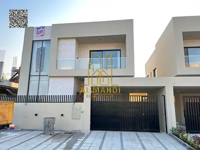 For sale: European-style villa, freehold, available to all nationalities, with monthly installments for 25 years, in Ajman, Al Zahia.