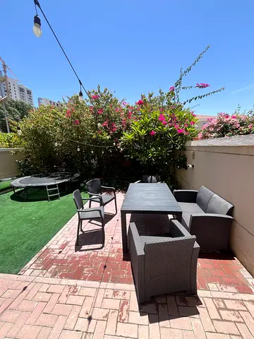 Outdoor rattan patio seating set with table - good condition