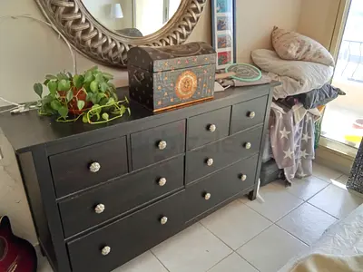 Solid dark wooden 7-drawer dresser with decorative knobs