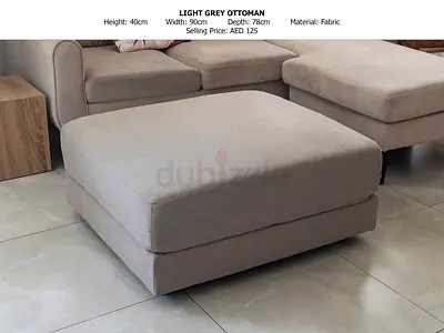 LIGHT GREY OTTOMAN. GOES WELL WITH SOFA SET.