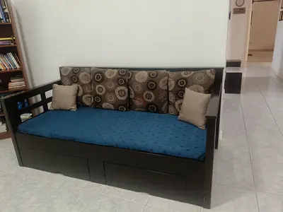 Dark wood daybed with storage and cushions - good condition