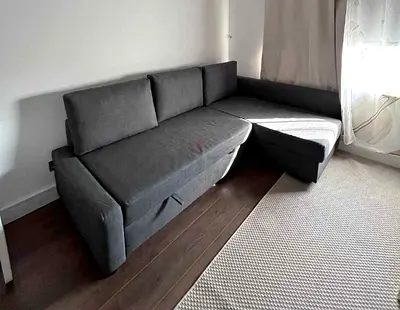 Grey L-shaped Sofa Bed with Storage - Good Condition