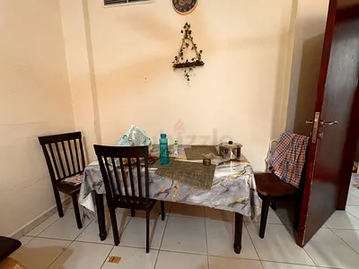 Wooden Dining Table with 4 Chairs - Good Condition