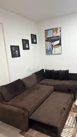 Dark brown L-shaped sectional sofa bed - excellent condition