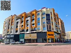 New shop for annual rent in Al Mowaihat 3, Ajman. Spacious with mezzanine, free month, main road loc