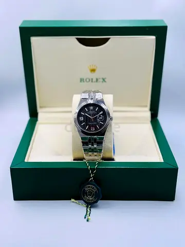 Rolex stainless steel wristwatch with box and tag - mens style