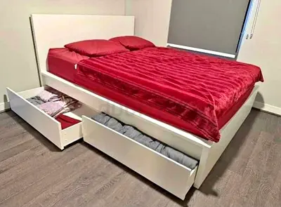 Ikea king size bed with matttess + storage