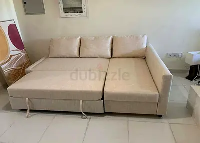 IKEA L shap Sofa store cum bed you can fix the storage