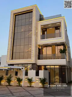 Corner villa for sale in Al Yasmin – direct view of Al Hamidiya Park, 3 floors and a roof, elevato