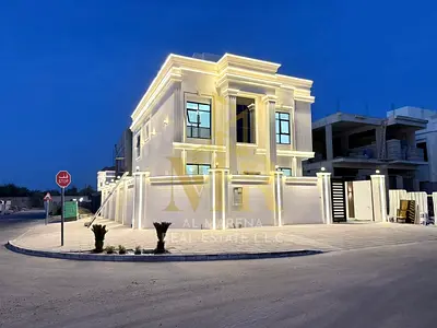 Modern villa for sale in Al Helio, Ajman. Two floors and a roof terrace. 6 master bedrooms. Include