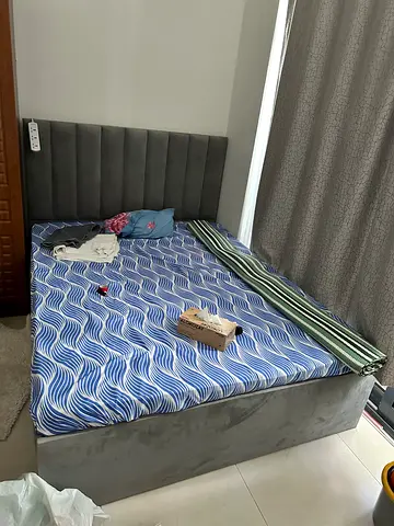 Grey upholstered queen bed frame with headboard and mattress (used) 1 Year old