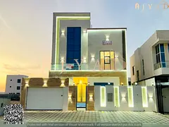For sale: modern villa in Al Bahia Ajman, 2 floors + roof, 6 master bedrooms, majlis, 3 living rooms