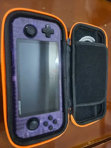 Retroid Pocket 3+ handheld console with protective case - purple