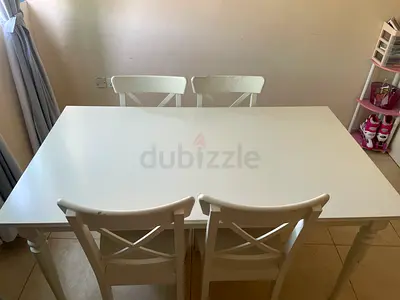 Four chair dining set. Fully white and normal used